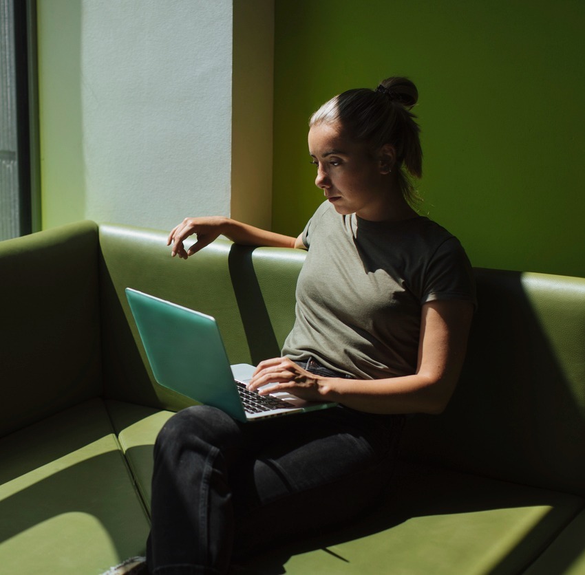 woman sitting with computer woman sitting with computer